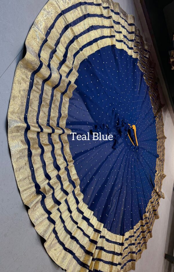 Teal Blue Pure georgette butti fabric skirt with heavy lampi laces