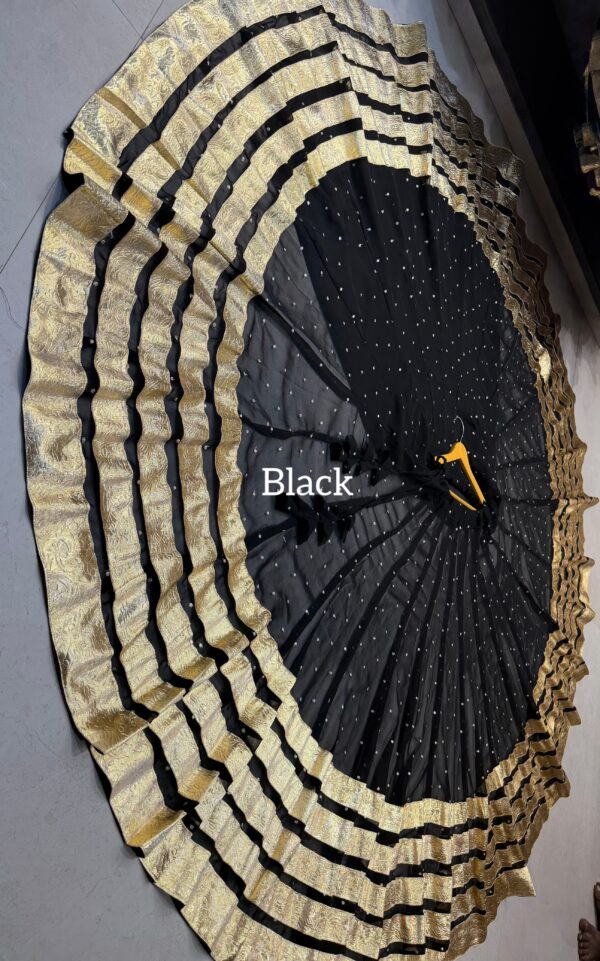 Black Pure georgette butti fabric skirt with heavy lampi laces