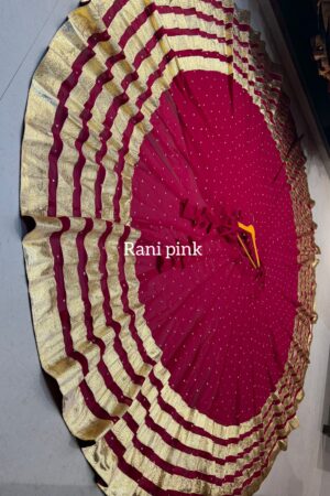 Rani Pink Pure georgette butti fabric skirt with heavy lampi laces